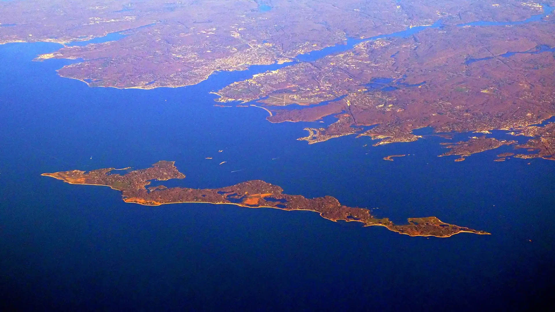 Aerial view of Fisher's Island, NY with the Connecticut coast in the background, April 2024
