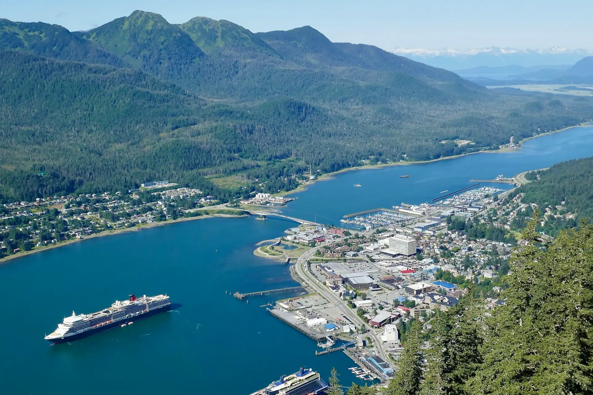 MS Queen Elizabeth in Juneau, Alaska on 15 August 2024. Downtown Juneau at right.