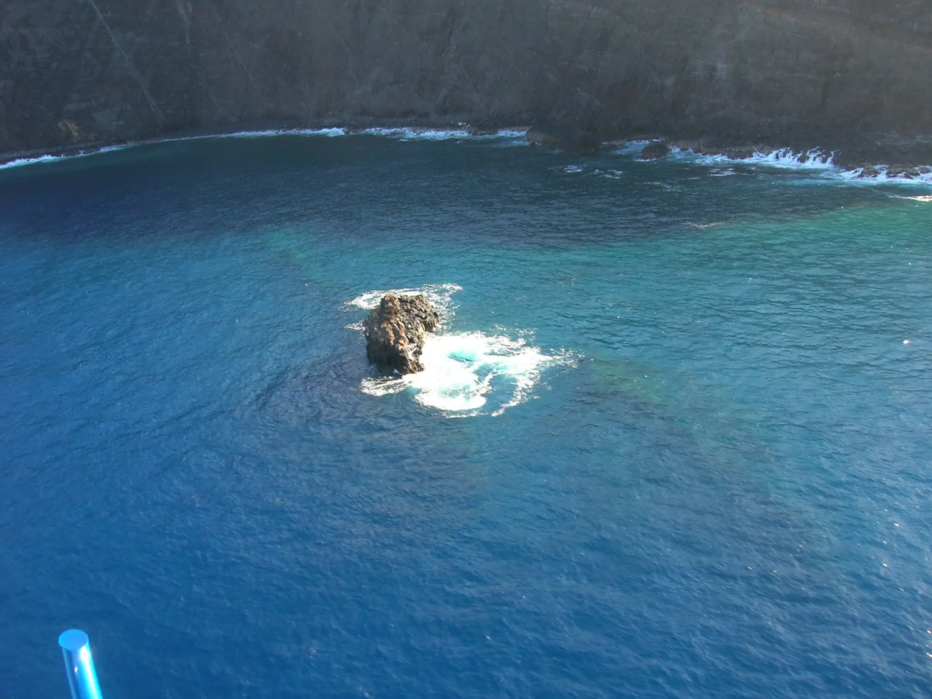 Aerial photograph (view islet off the coast of Lanai). Location: Lanai, Moku Naio (islet)