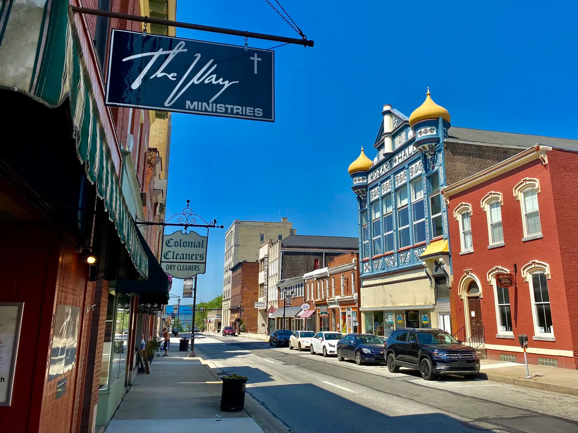 Looking southwest along Main Street from just past the corner of South Alexandria Street in downtown Latrobe, Pennsylvania in June 2021.