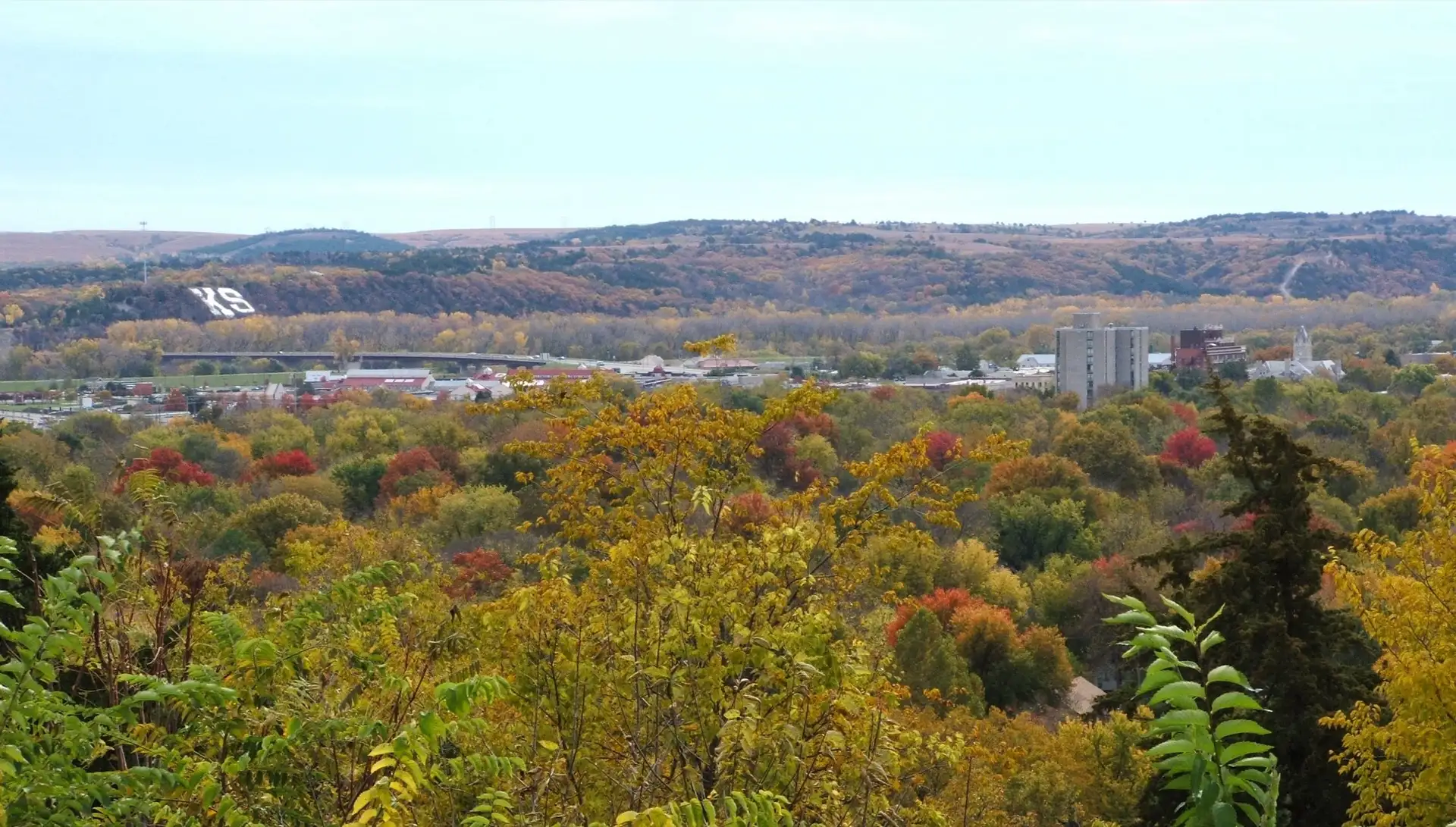 Picture of Downtown Manhattan, Kansas, USA and K-Hill. Taken in October, 2005 modified with the GIMP.
