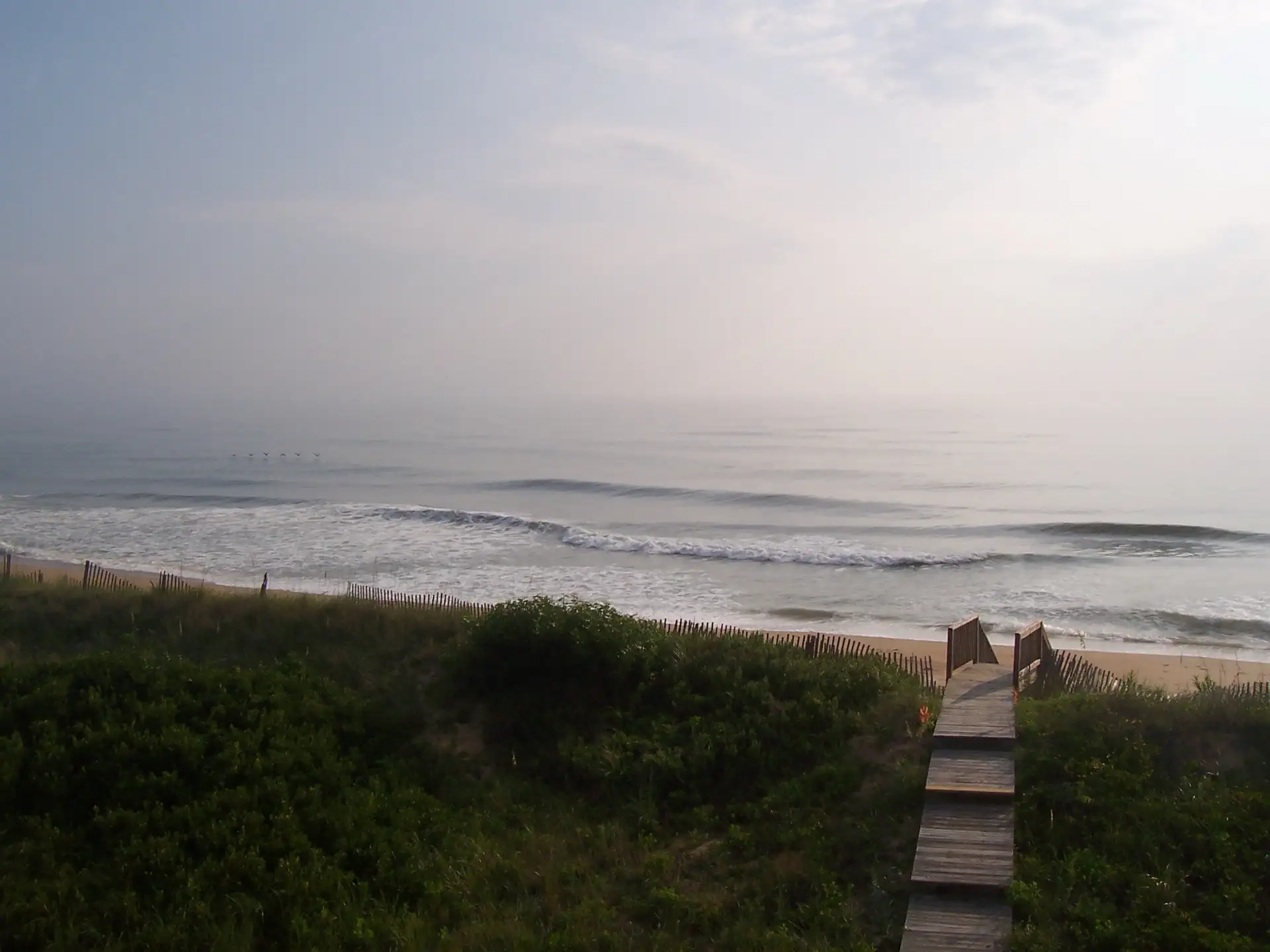 View of Atlantic Ocean in early morning in summer, Outer Banks, NC