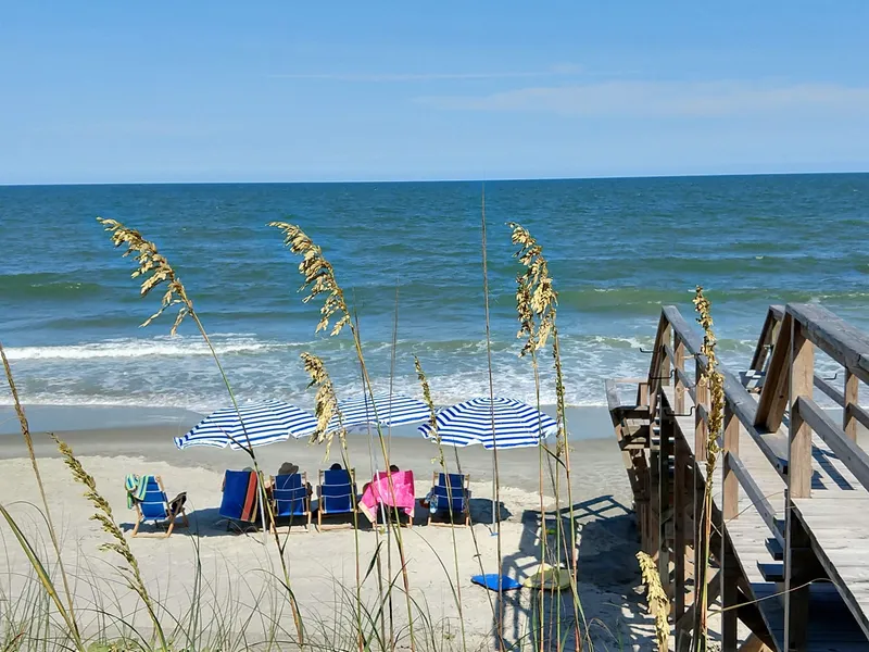 Beach at Pawleys Island, South Carolina, July 2019, with seagrass in foreground