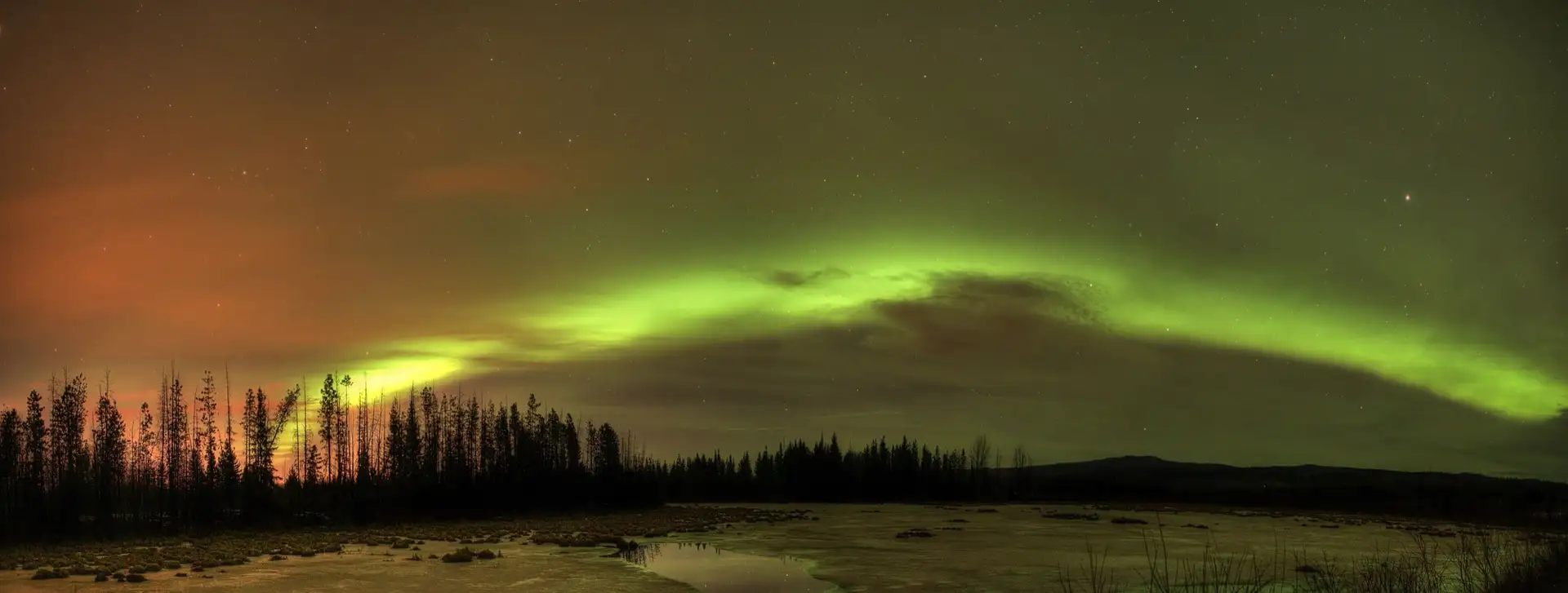 Late night panorama of the northern lights just outside Prince George